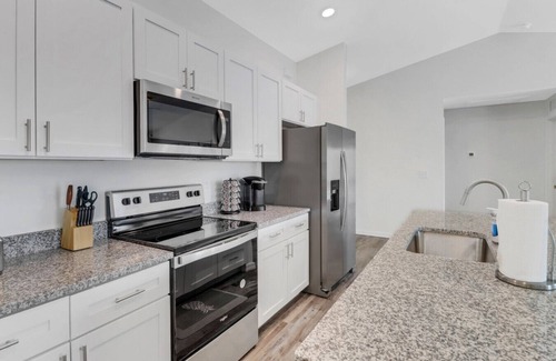 Diplomat House | Oasis W/Heated Salt Water Pool & Private Pier! Great for 2 Families!
