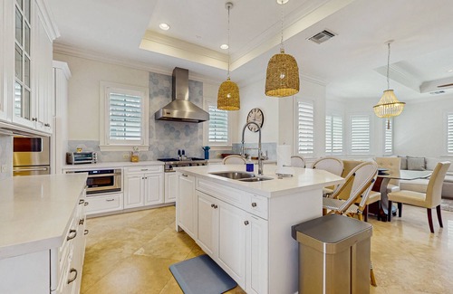 Ocean Ridge House | Ocean view estate w/in ground outdoor pool, breezy terraces, and covered lanai