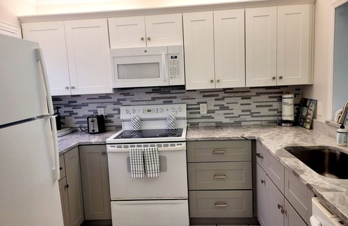 Crescent Beach Condo | Ocean view (pool side) 2 bedroom, 2 bath flat. Corner unit.