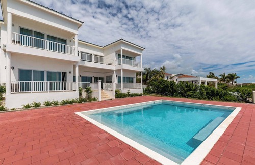 Juba Sound Apartment | Ocean Views & Pool | Near Grace Bay & Dining
