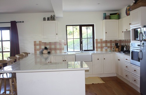 Caherdaniel House | Ocean views, walk to beach from Pairc An Dreolin on The Ring of Kerry.