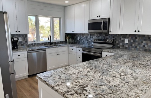 Inlet Harbour House | Oceanfront 6 bedroom dog friendly heated pool
