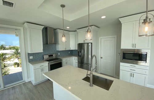 Cutthroat Harbor Estates House | Oceanfront Oasis with Private Heated Pool and Dock. Beautiful Newer Build!