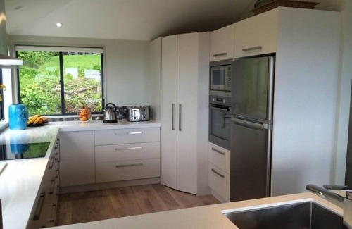 Ohope House | Ohope Beach house across the road from surf club & beach, wide ocean views