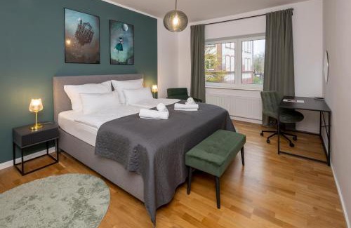Wiesdorf Apartment | OLIVE Apartments - 2x Kingsize Betten - sehr zentral