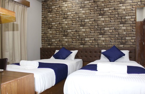 Madiwala Hotel | Olivia Inn And Suites