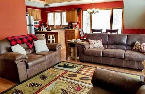 Thompsonville House | On the Betsie River, fish off dock, close to Crystal Mountain, trails, lakes!