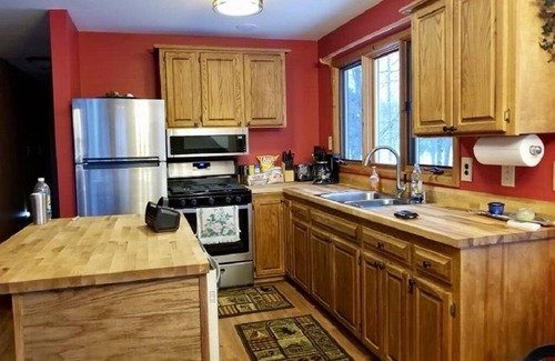 Thompsonville House | On the Betsie River, fish off dock, close to Crystal Mountain, trails, lakes!