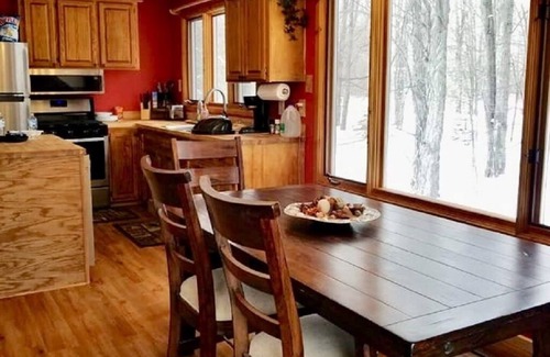 Thompsonville House | On the Betsie River, fish off dock, close to Crystal Mountain, trails, lakes!