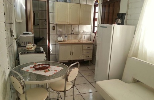 Barra da Lagoa Apartment | One-bedroom apartments with air conditioning, pool and barbecue on the patio