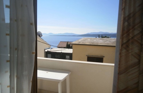 Igrane Apartment | One bedroom apartment with balcony and sea view Igrane, Makarska (A-13535-b)