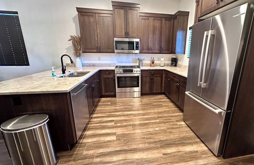 Hurricane House | One Bedroom Casita with access to private pool and full size indoor sports court