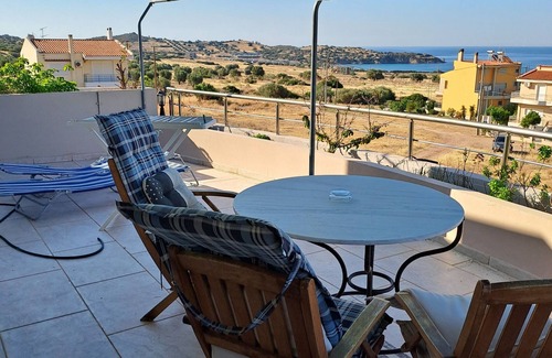 Charakas Apartment | One-bedroom suite on the third floor with panoramic views,accessible by elevator