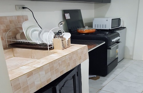 Puerto Princesa City Centre House | One Bedroom village House Close to Beaches