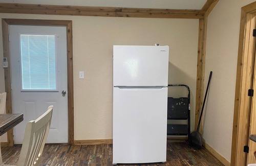 Anacoco Cabin | One bedroom with lake view.