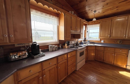 Bonshaw Cottage | Open Concept 4 Bedroom Cottage, Just Steps Away From South Shore Beach
