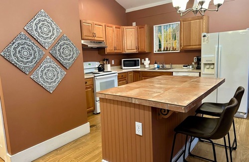 Westcliffe Hotel | Open concept kitchen/living & dog friendly