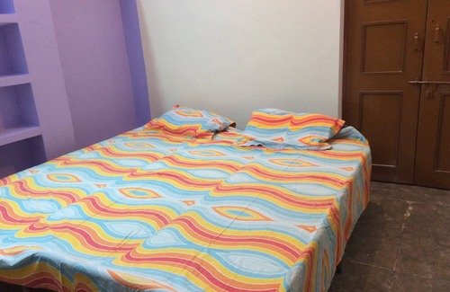 Aliganj House | Open terrace with double bedroom