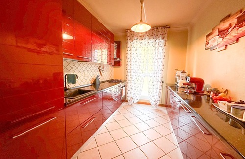 Rivoltella House | ORANGE ROOM WITH GARDEN VIEW