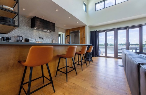 Panama City House | Organically Designed Spacious Home w/a Resort Style Heated Pool & Private Dock