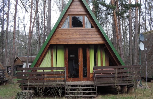 Sierakow Ski Chalet | Original holiday chalet in Dutch managed holiday park with swimming pool