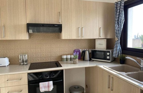Oroklini Apartment | Oroklini : Two bedrooms apartment with private Roofgarden sea view.