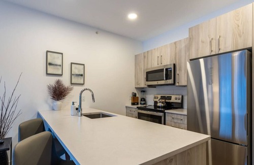 Golden Condo | OSO Summit Downtown Riverfront Condo
