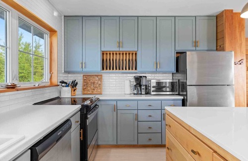 Malpeque House | Osprey’s Landing- Executive oceanfront beach house