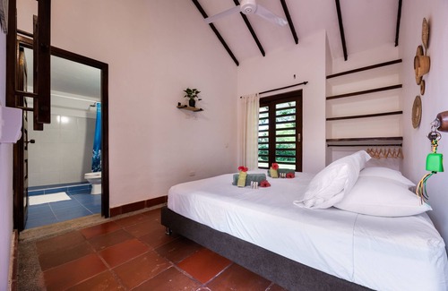 Palomino Cabin | Our Forest lodge consists of 7 rooms, a mandala-style garden