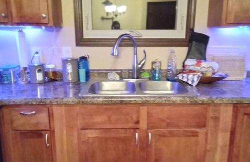 Lansing House | Outdoor Hot Tub, Cozy king bed, Private entrance
