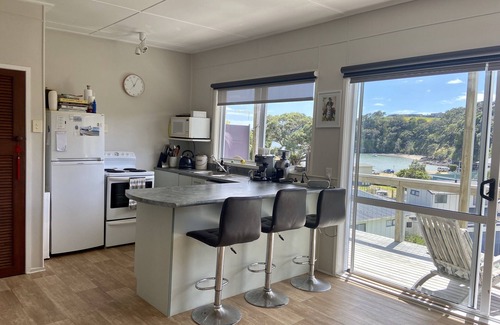 Tutukaka House | Overlooking beautiful Tutukaka Harbour. Only 100m from Pacific Bay beach