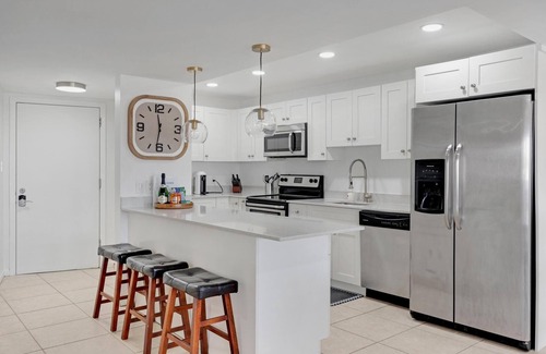 Key Largo Condo | Overlooking The Marina and Ocean Includes Use of Golf Cart Pet-Friendly