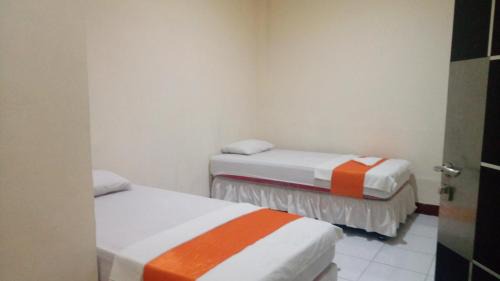 Biringkanya Hotel | OYO 2703 Hotel Transit 1