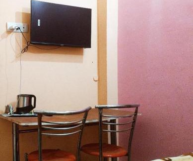 Jwalapur Hotel | OYO Home Holiday Inn - Stay Home
