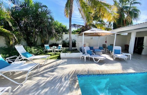 Noord Villa | Palm beach suite steps away from the beach
