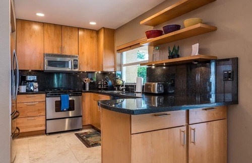 Garden Isles House | Palm Villa: New Remodel/Waterfront/Salt Water Pool!
