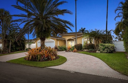 Garden Isles House | Palm Villa: New Remodel/Waterfront/Salt Water Pool!