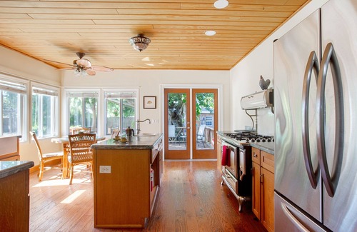 Parrot Cove House | Palmway Tropical Oasis - Heated Pool, Beach & Golf