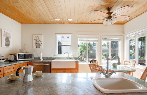 Parrot Cove House | Palmway Tropical Oasis - Heated Pool, Beach & Golf