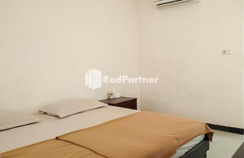 Palu Hotel | Palu City Guest House Mitra RedDoorz