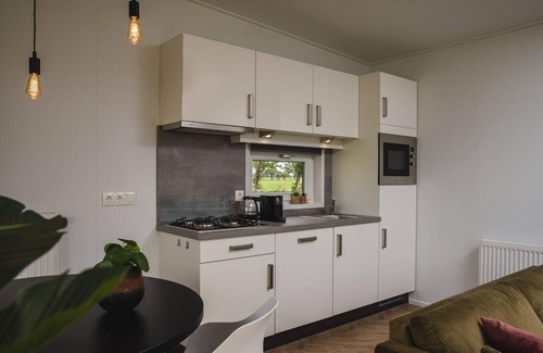 Municipality of Rijssen-Holten Ski Chalet | Panorama lodge with jacuzzi | 2 p.