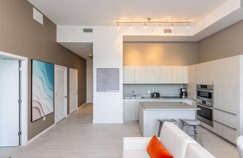Hallandale Beach Apartment | Panoramic bay views meet modern elegance in this 1-bedroom retreat