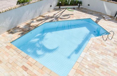 Jardim Centenario Apartment | Paraiso no Guarujá Enseada - Piscina - Ar Condicionado - WIFI - Garagem