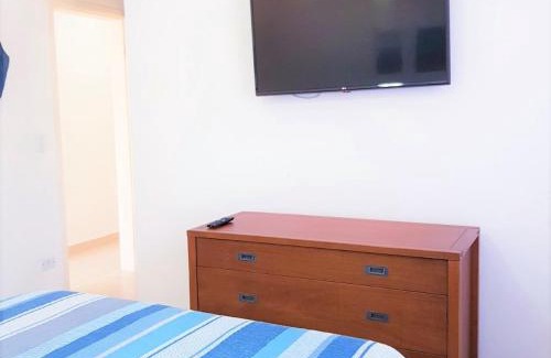 Jardim Centenario Apartment | Paraiso no Guarujá Enseada - Piscina - Ar Condicionado - WIFI - Garagem