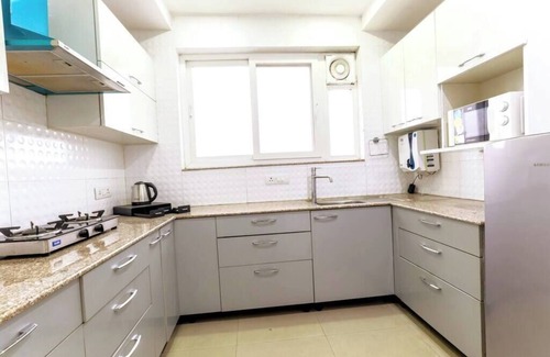 Gurugram Apartment | Parfait Street retreat 2Bhk Paras Fortis Balcony