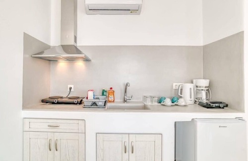 Aliki Apartment | Paros Poolside Gem - Athena's Sea Getaway