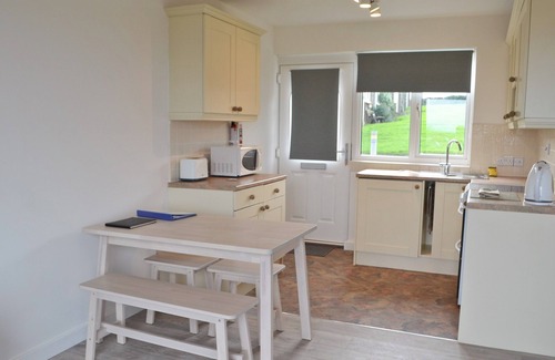 Embleton Cottage | Part of a small terrace of bungalows with uninterrupted views towards the sea.