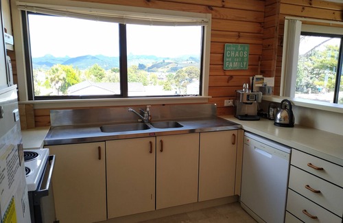 Pauanui House | Pauanui bach with great outdoor living and views.