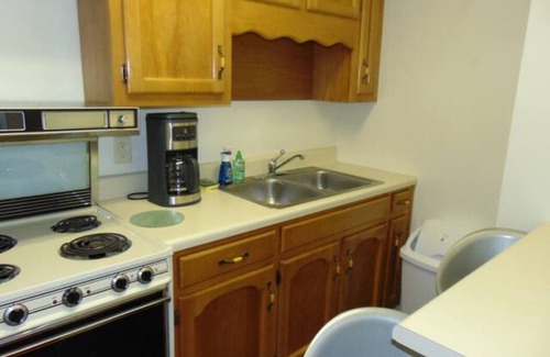 Anniston Apartment | Peace Apartment, upstairs with king size bed.