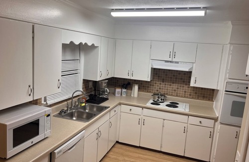 Anniston Apartment | Peace Apartment, upstairs with king size bed.